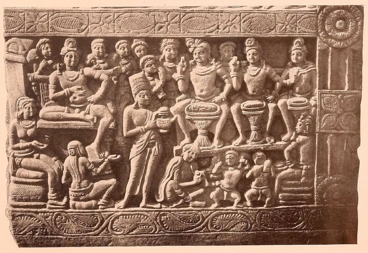 Carved relief of seated figures on thrones above and attendants below, framed by pilasters.
