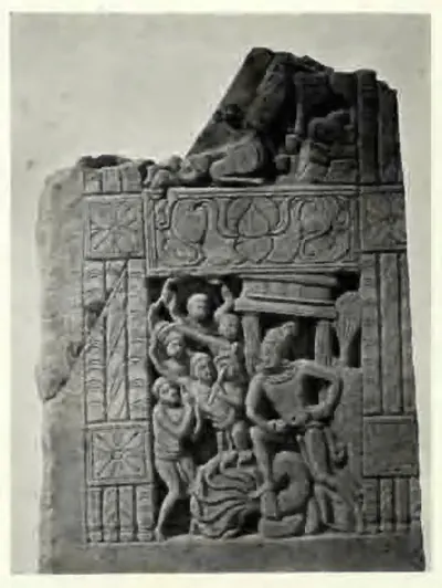 Broken carved slab with a group of figures in a framed doorway.