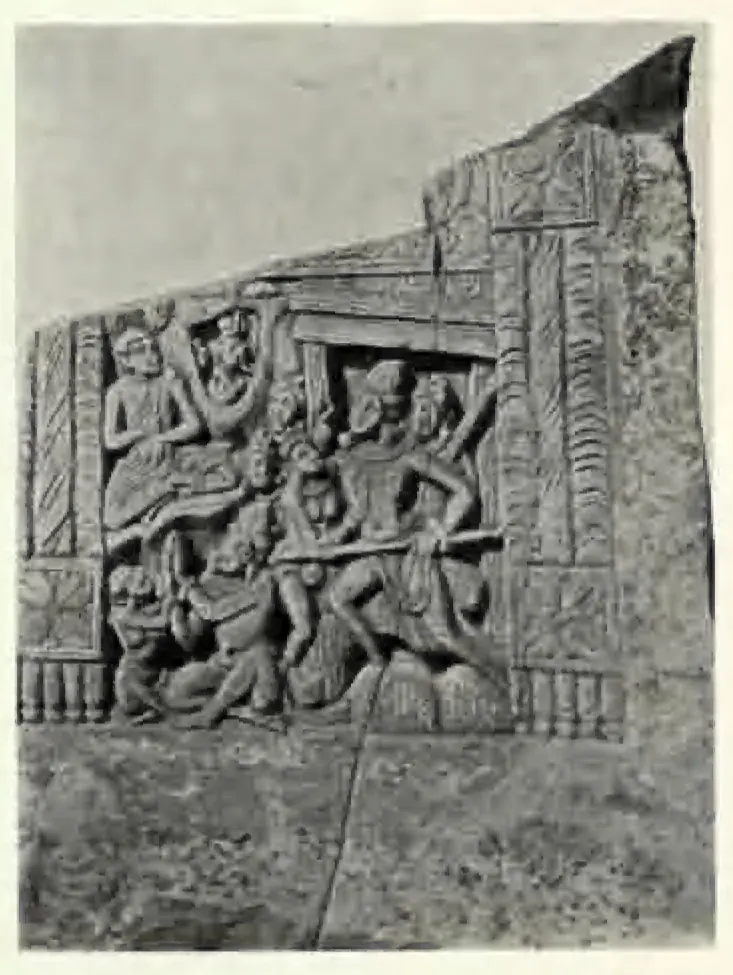 Broken carved slab with a crowded scene of figures in a framed doorway.