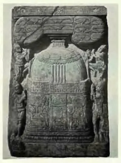 Upright carved slab with a domed stupa decorated in bands and attendant figures at the sides.