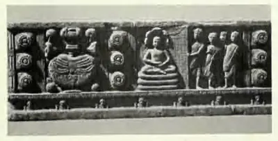 Long carved beam panel with seated and standing figures between rows of lotus roundels.