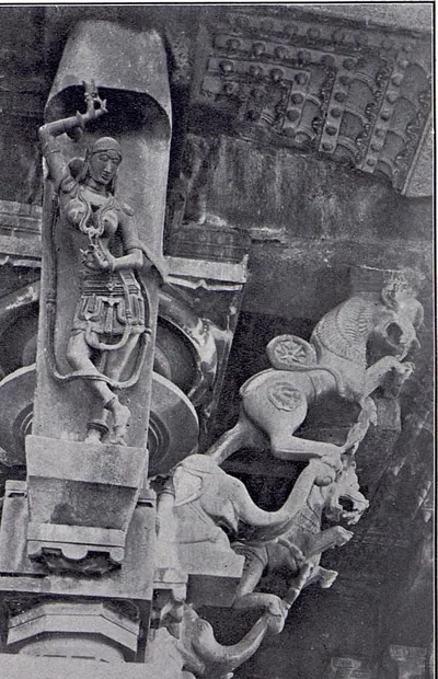 A bracket carved with a dancer with one arm raised, next to two rearing animal brackets projecting from the pillar below the eaves.