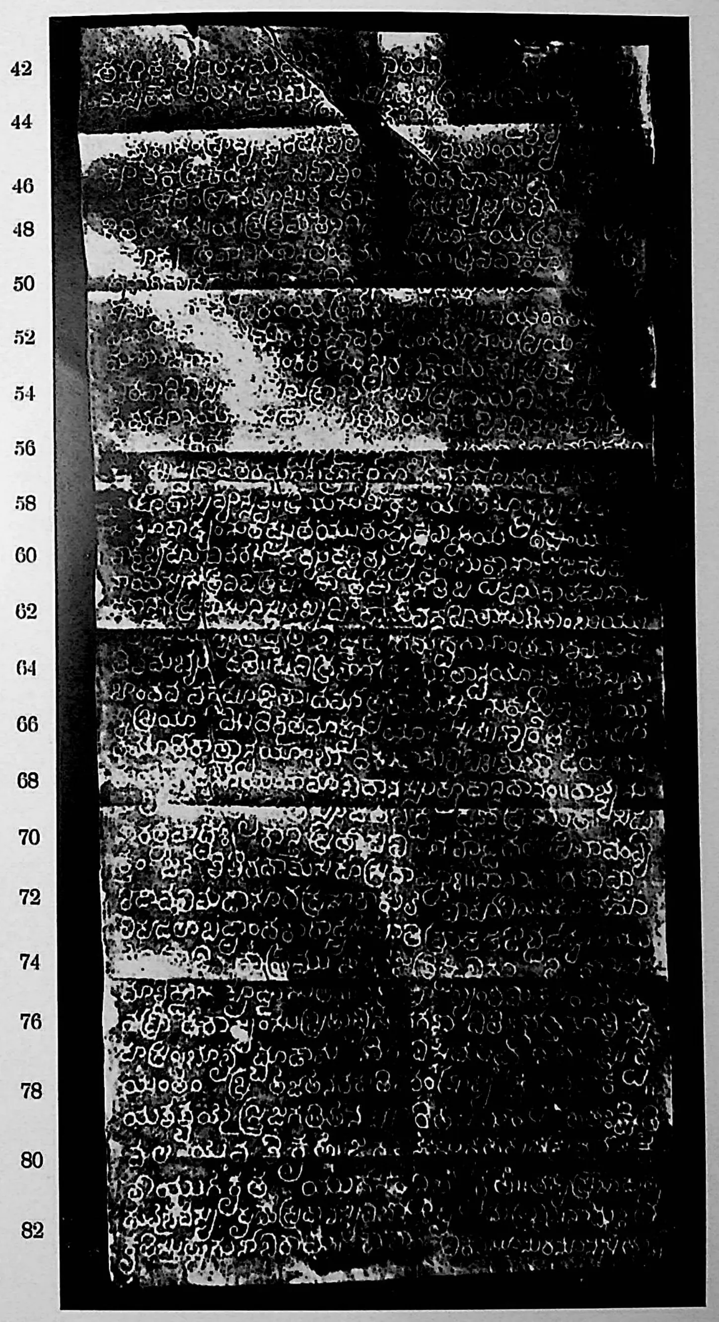 Ink impression of face II of the "Pillalamaṟṟi inscription of Nāmi-Reḍḍi", white Telugu-Kannada letters on a black ground, with line numbers in the margin.