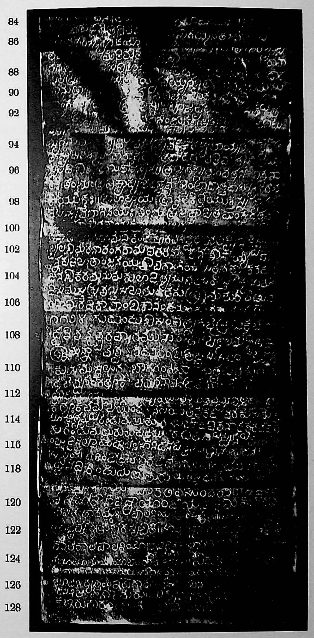 Ink impression of face III of the "Pillalamaṟṟi inscription of Nāmi-Reḍḍi", white Telugu-Kannada letters on a black ground, with line numbers in the margin.