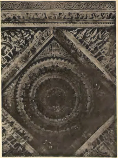 A carved stone ceiling panel of the southern temple at Nagulapadu: a deep circular lotus of concentric rings set in a square turned diagonally, framed by bands of figures and foliage.