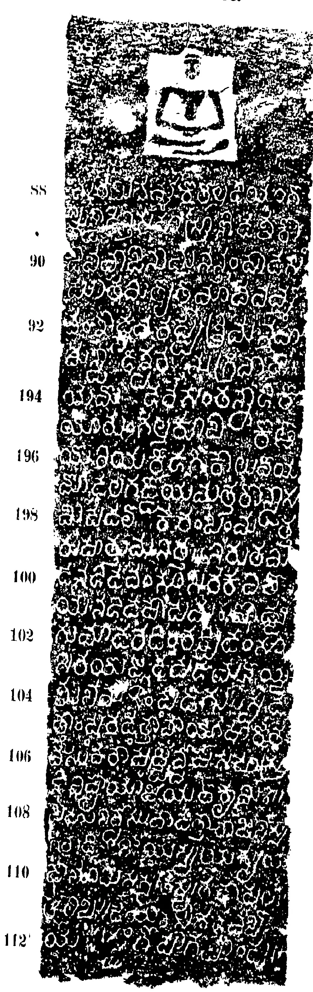 Ink impression of one face of an inscribed pillar: a seated Jaina figure in a pale square at the top above rows of white Kannada letters on black, numbered 88 to 112 in the margin.