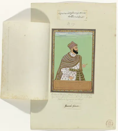 Album page with a Deccani painting of a bearded man in a striped shawl and turban against a green ground, mounted on a larger sheet with a folded flap and handwritten notes.