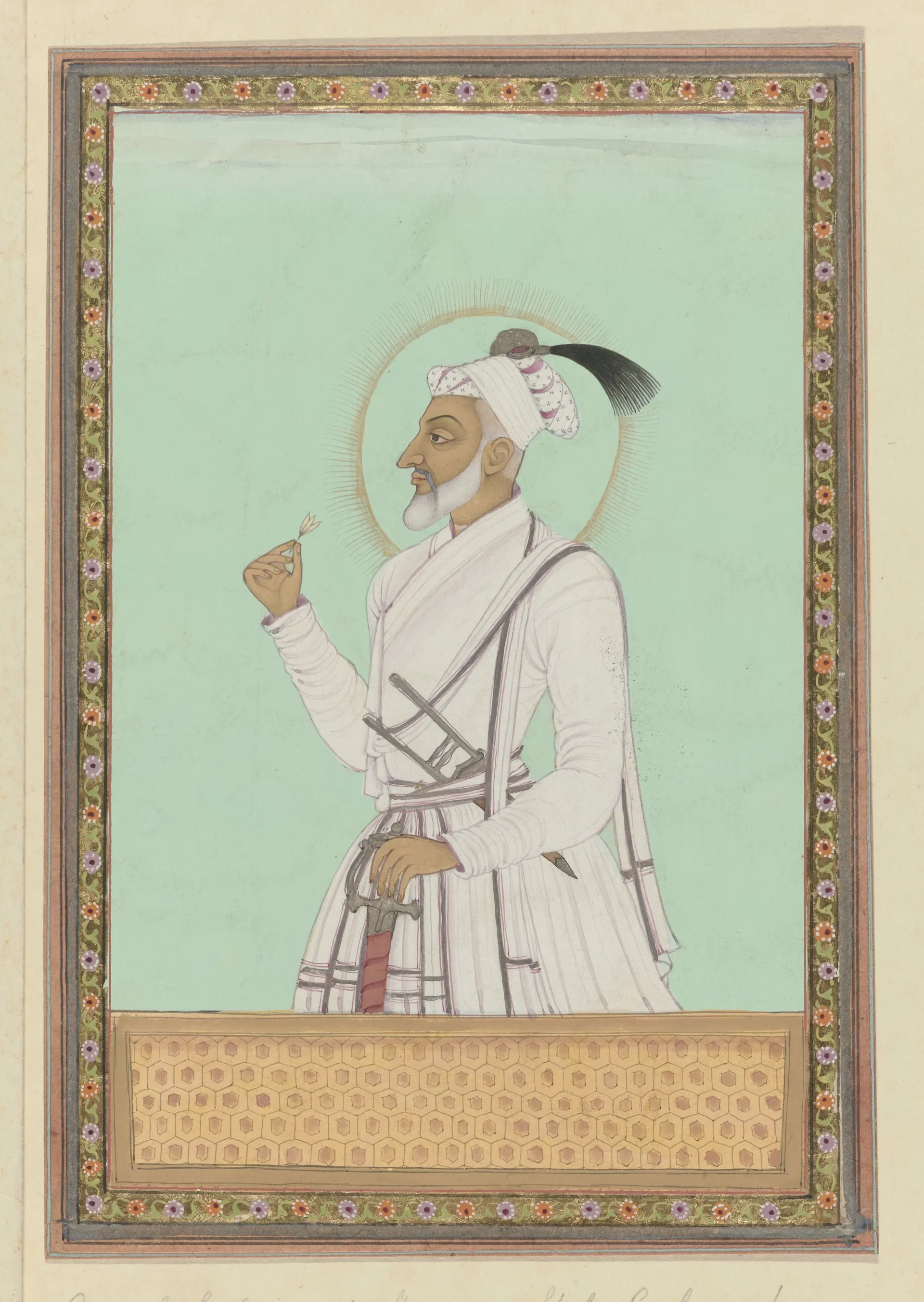 Deccani painting of an elderly white-bearded man in white robes and turban, standing in profile with a halo against a pale green ground, in a decorated border.
