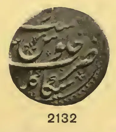 Photograph of one face of a round gold coin with Persian script in relief, numbered 2132 below.