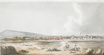 Hand-coloured etching of a walled island town with towers seen across a sandy river bank, with horsemen in the foreground and hills behind.