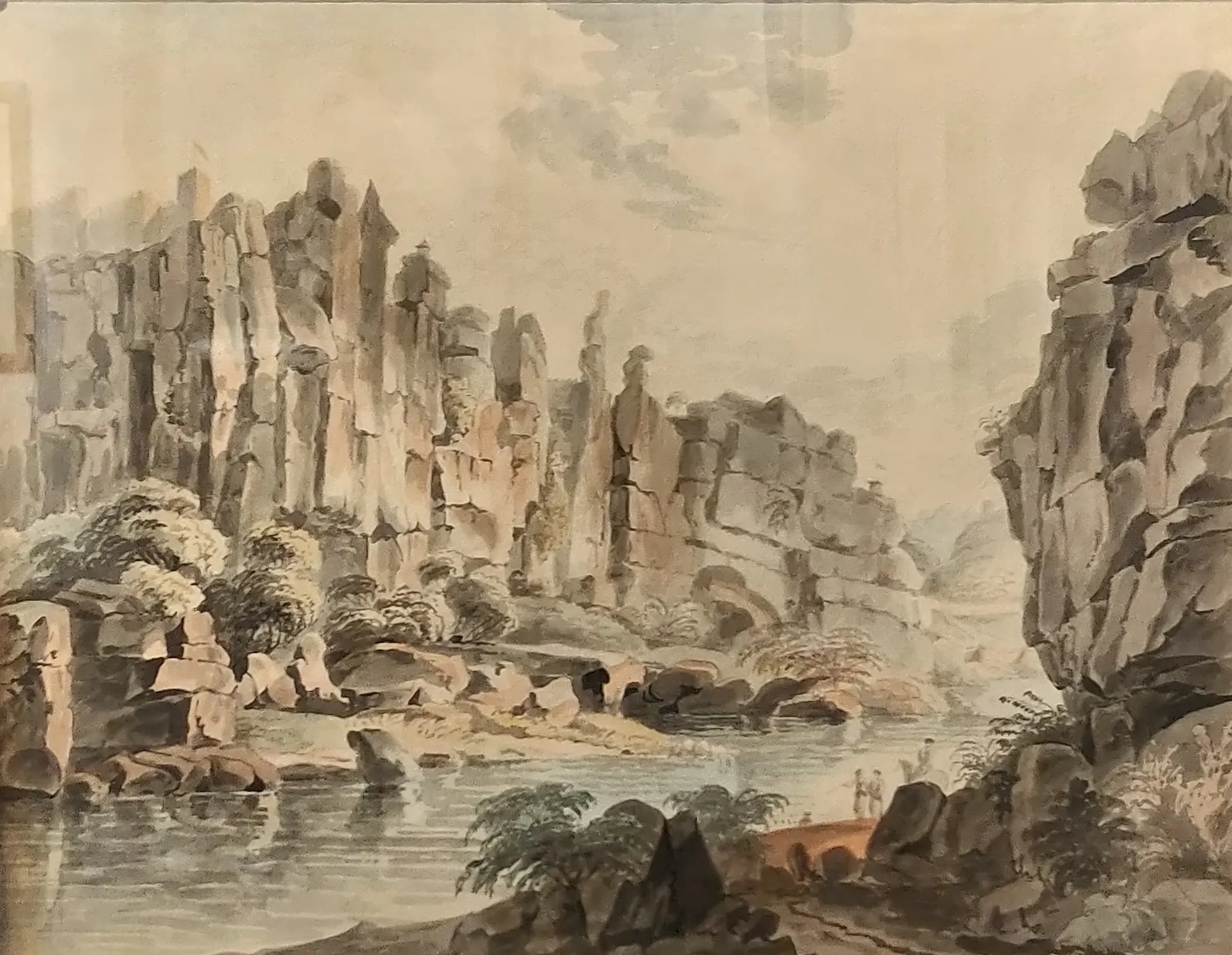 Watercolour of a river in a deep gorge between tall, layered cliffs, with trees and rocks on the near bank and small figures by the water.