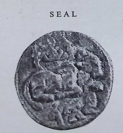 Photograph of a round bronze seal, worn, with a raised couchant animal across the middle, under the printed word "SEAL".