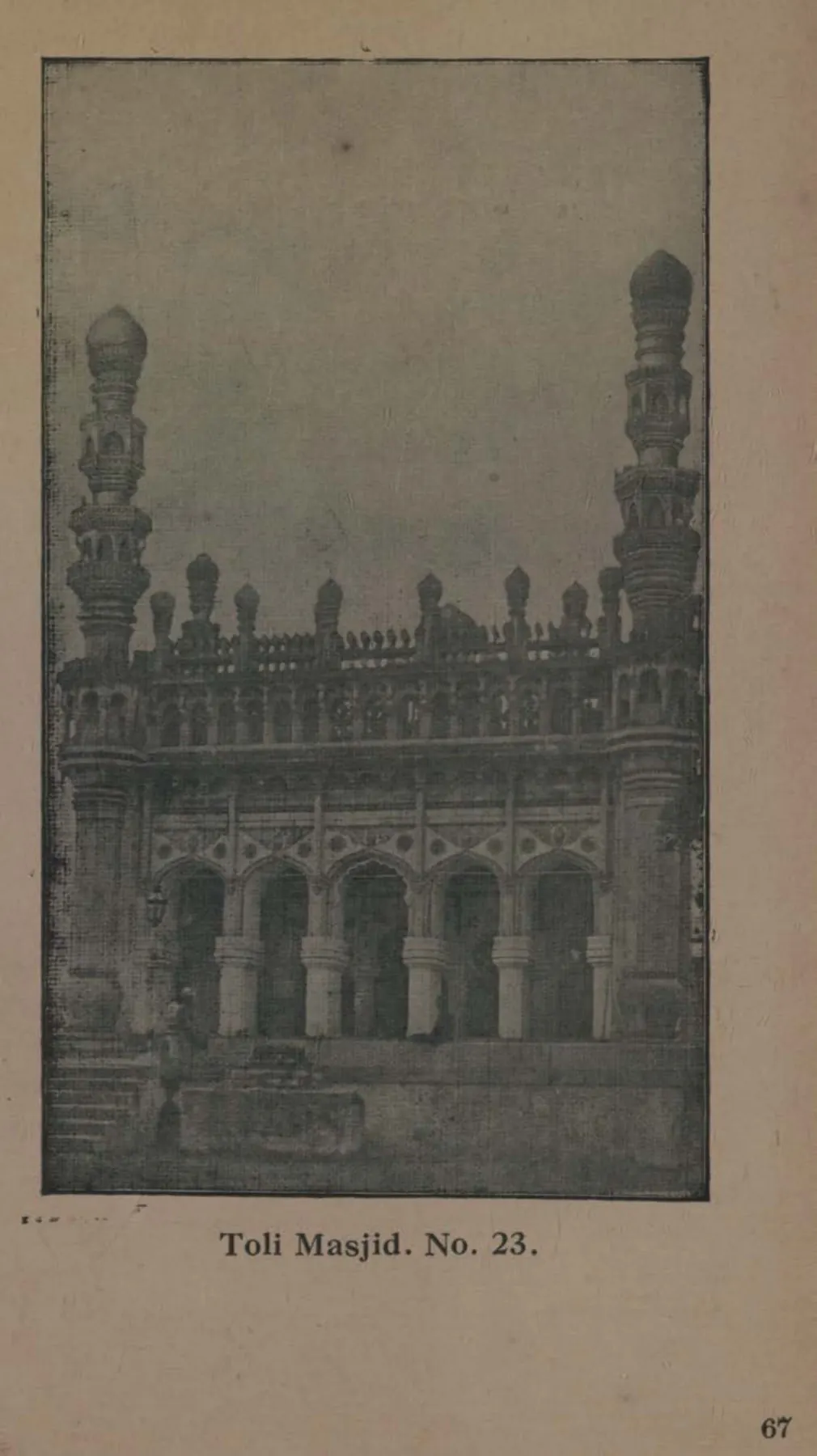 Photograph of the facade of the Toli Masjid with its arched openings, carved parapet and two tall minarets.