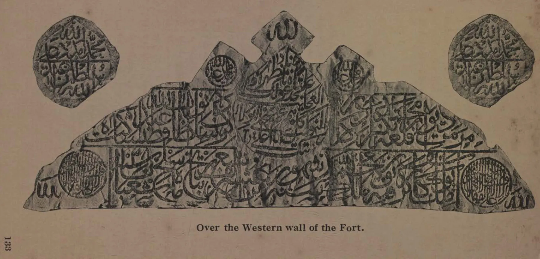 Rubbing of an arch-shaped Persian inscription with three roundels from the western wall of Golconda Fort.