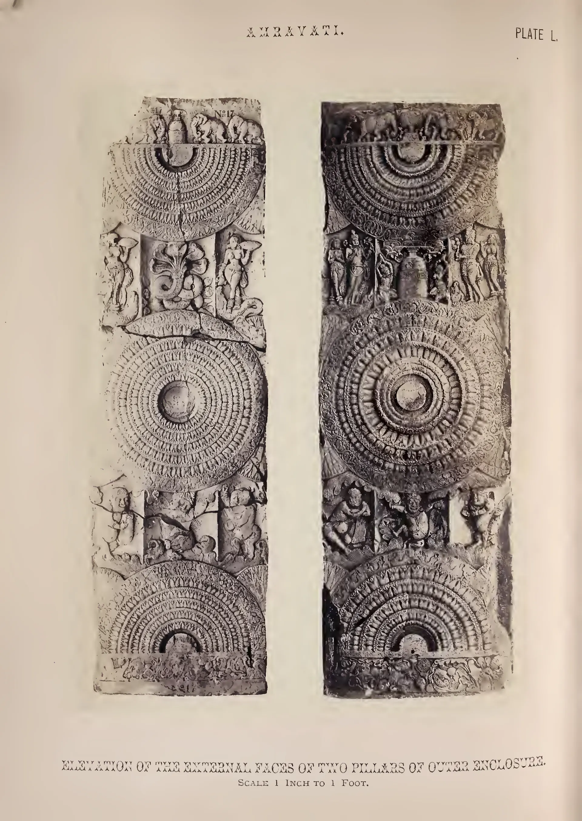 Photograph of two carved rail pillars with lotus medallions and small figure panels.