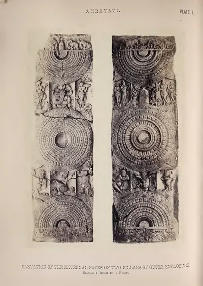 Photograph of two carved rail pillars with lotus medallions and small figure panels.