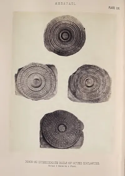 Photograph of four circular lotus-carved cross-bar discs.
