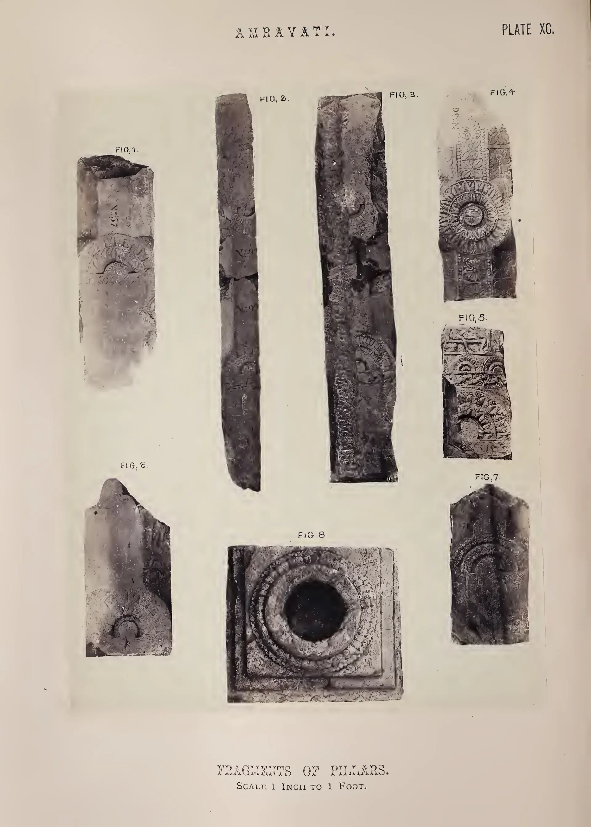 Photograph of pillar fragments and a square base with a socket.
