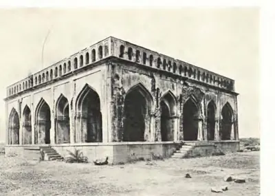 Photograph of a square pavilion with five pointed arches on each side, a carved parapet and steps up to its plinth.