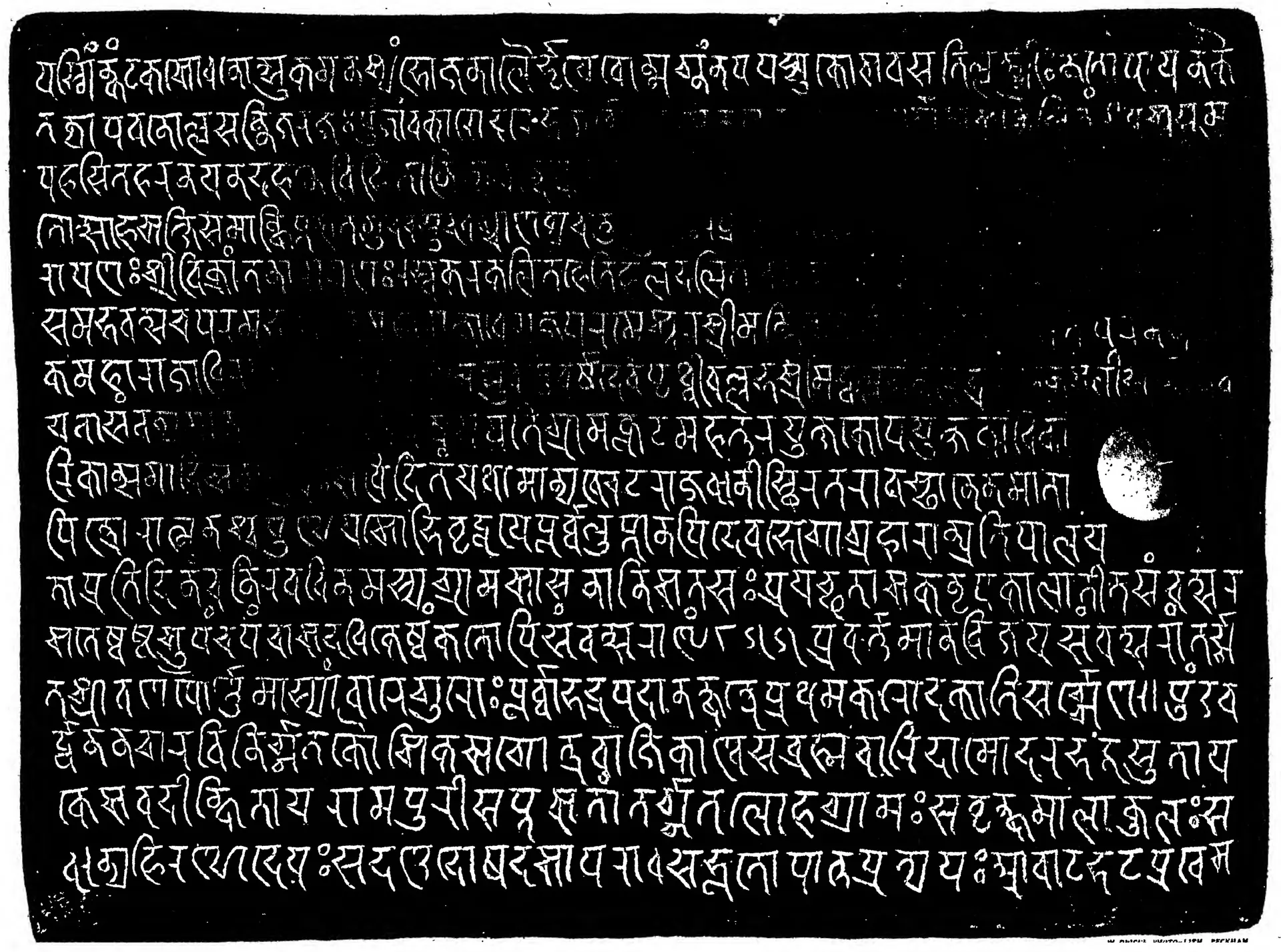 Facsimile of an inscribed copper plate, white Sanskrit letters in Nagari on a black ground in about twenty long lines; the second plate, second side.