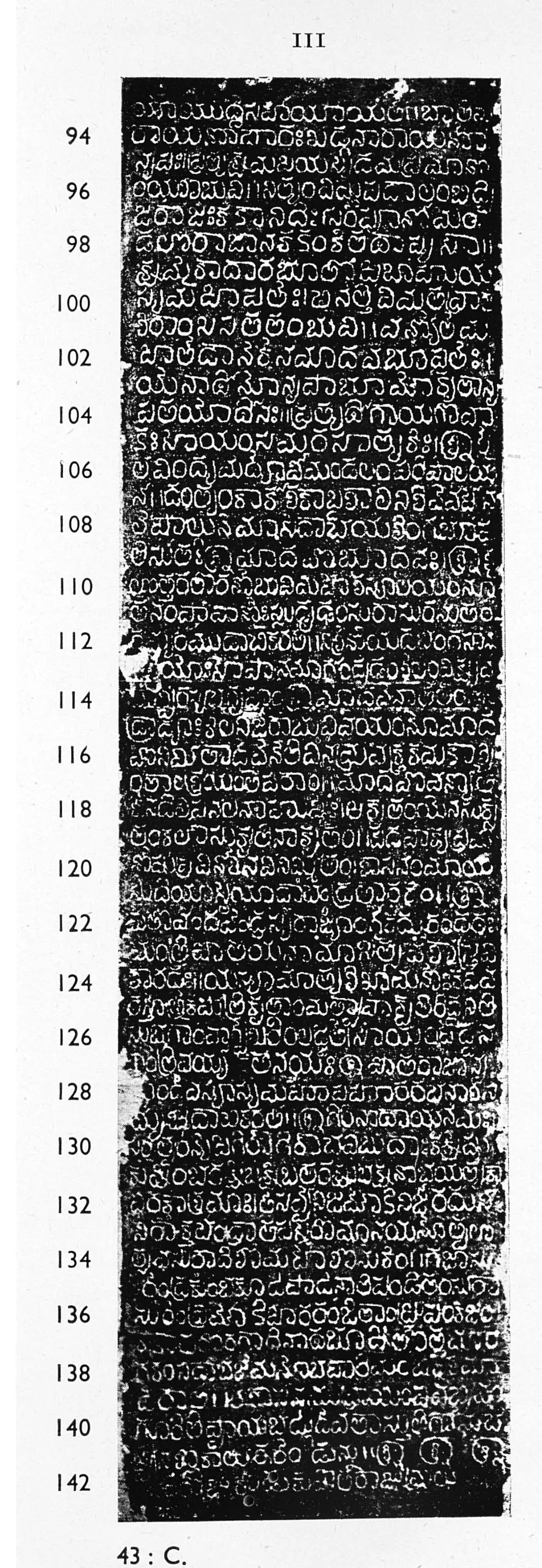 Photograph of an ink impression of a tall narrow inscribed stone face, white Telugu letters on black in close lines, with line numbers 94 to 142 in the left margin.