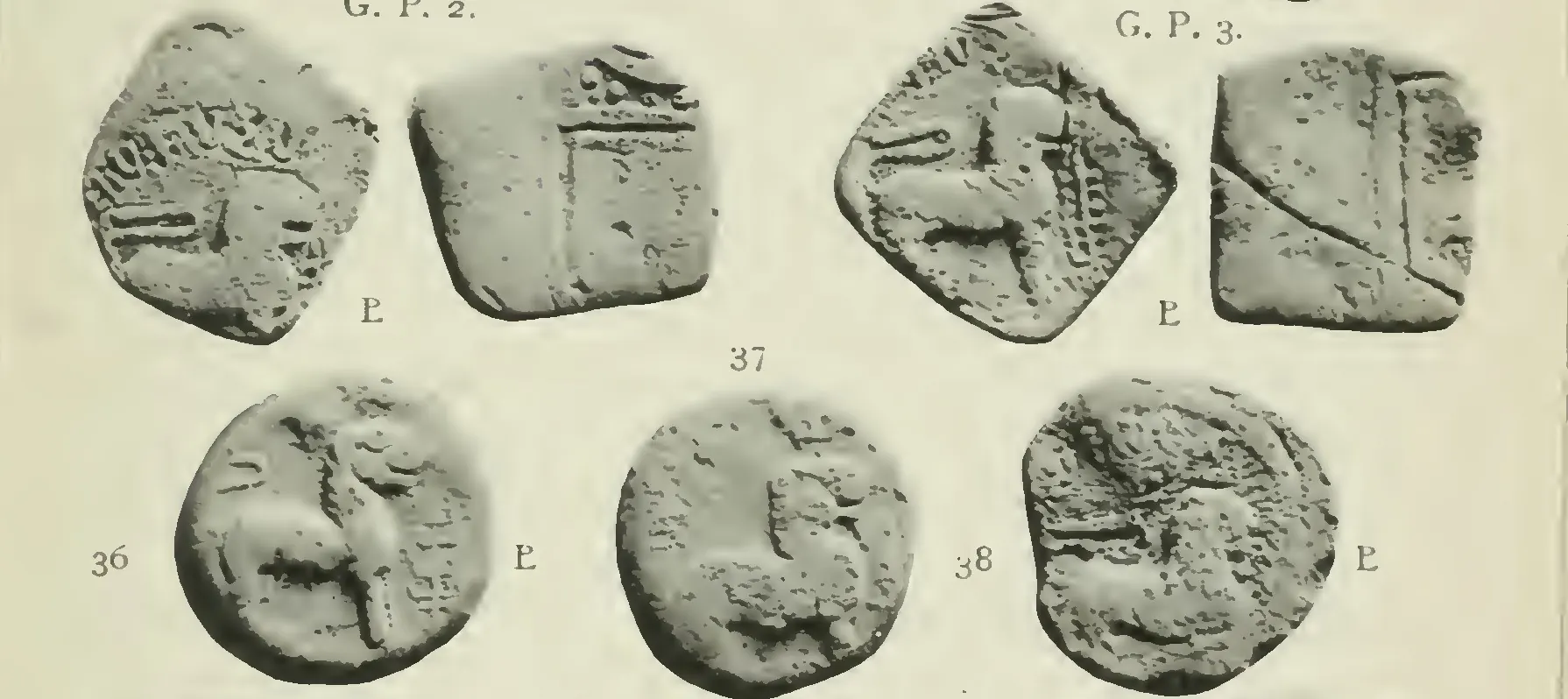 Two square lead coins shown on both faces and three round ones below, each with a lion standing to the right in front of a tree in a railing; the square reverses show a stepped chaitya in a double border.