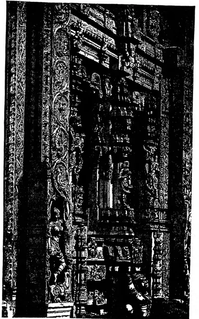 Dense black-and-white woodcut of the deeply carved stone jambs and walls of a temple gateway at Tadpatri, covered with figures and mouldings.